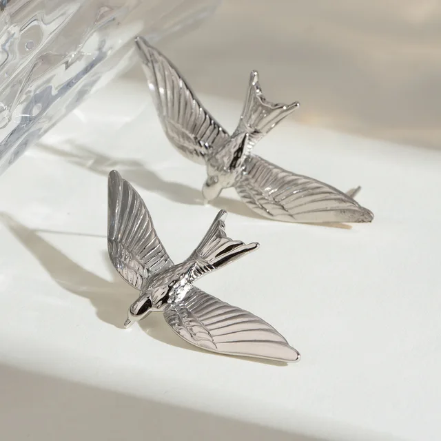 Winged Grace Silver Drop Earrings