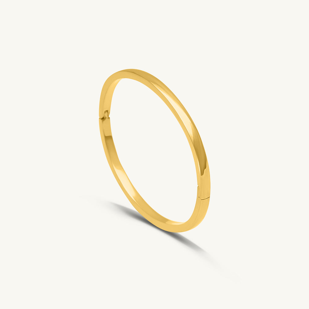 Elliptical Grace Gold Bangle Bracelet