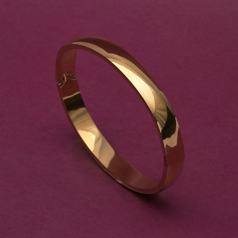 Elliptical Grace Gold Bangle Bracelet