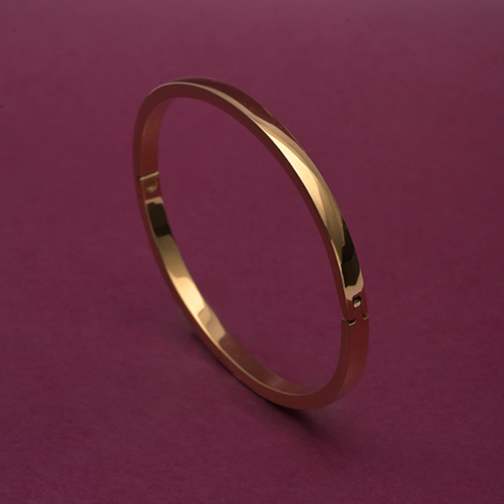 Elliptical Grace Gold Bangle Bracelet