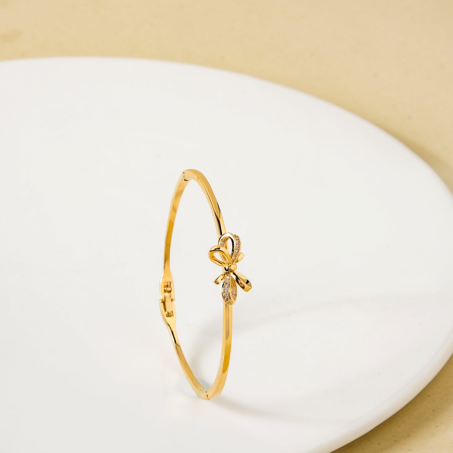 Gold Stone Studded Bow Bracelet
