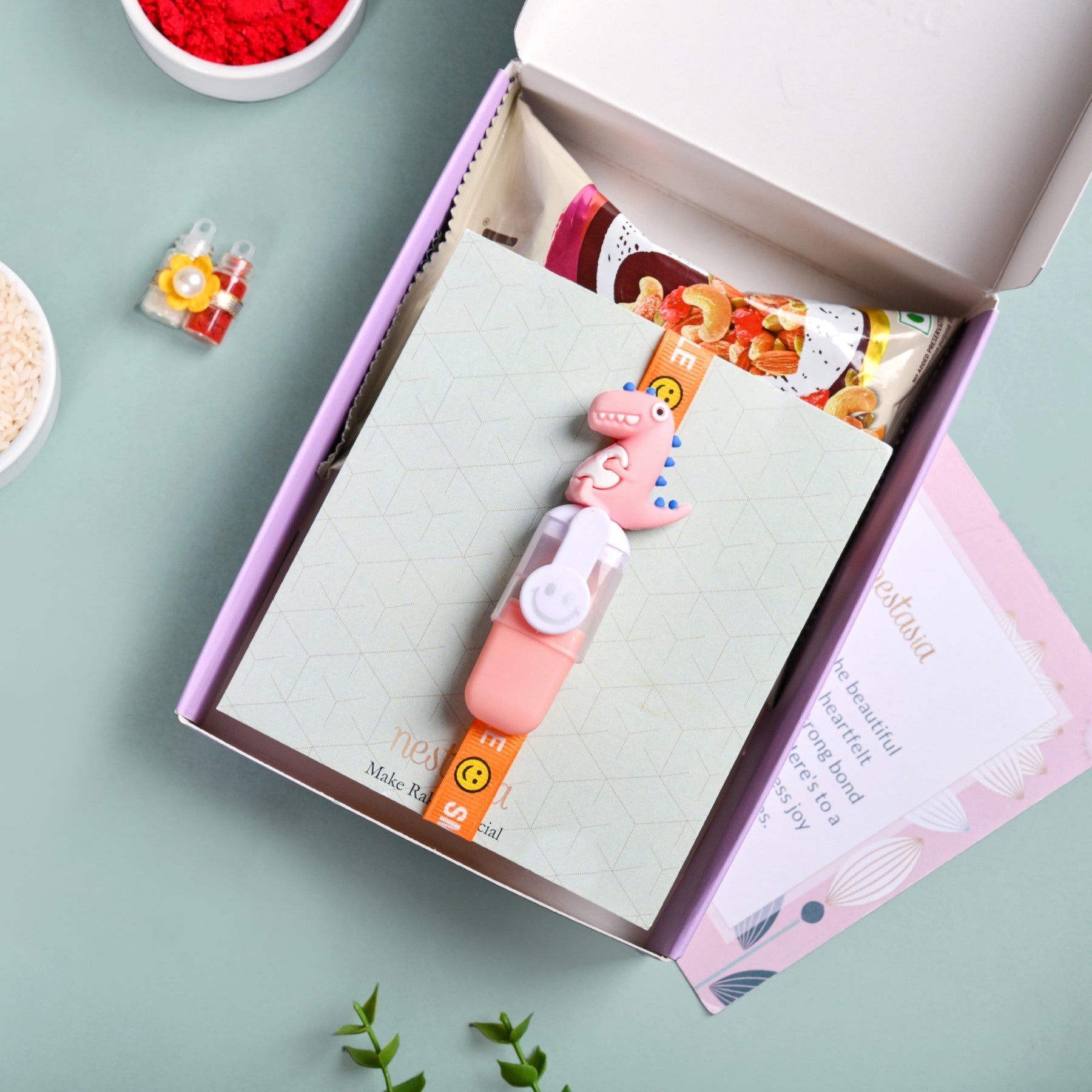 Orange Dino Rakhi Gift Set