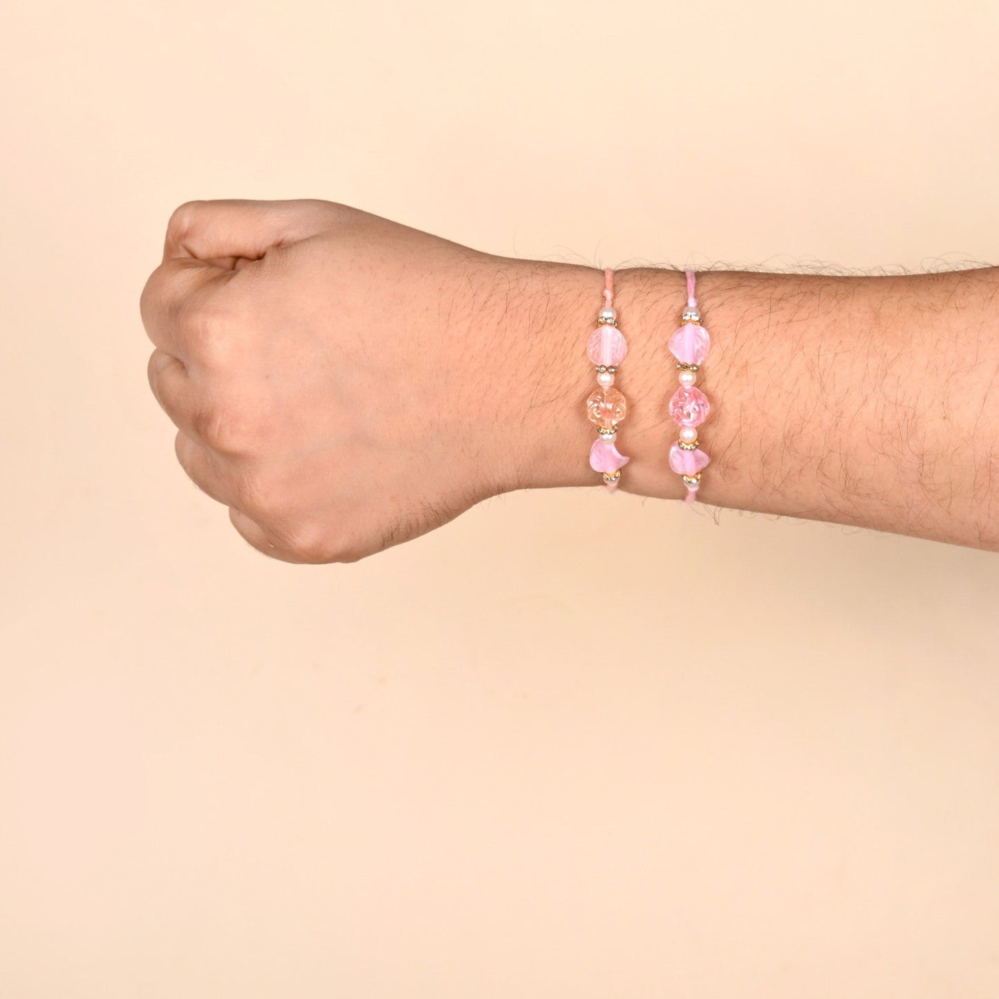 Peach and Pink Beaded Rakhi Set Of 2