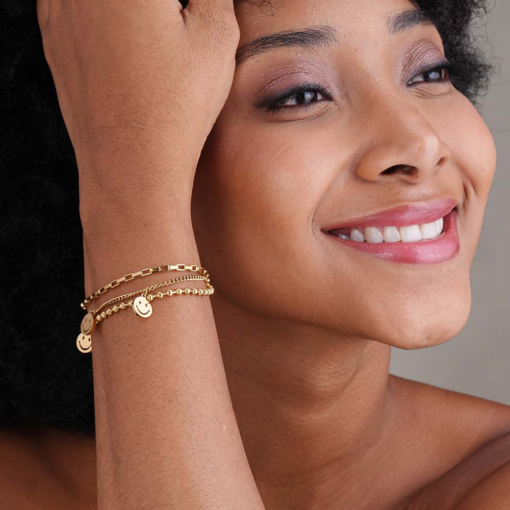 Golden Gleam Charm Bracelet