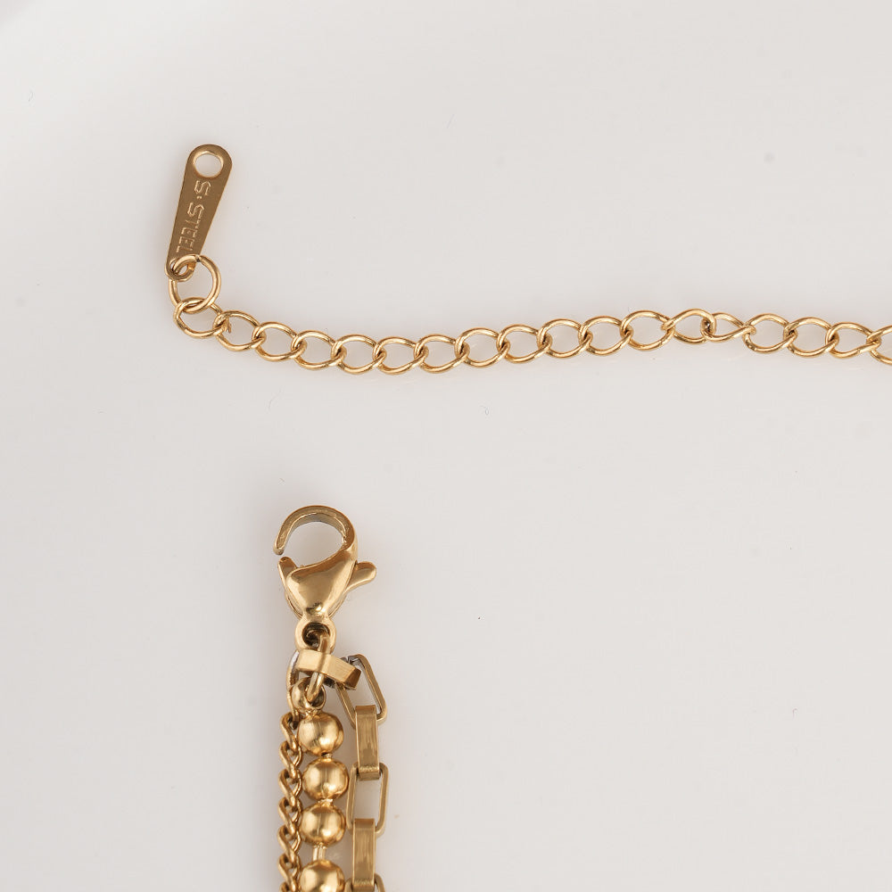 Golden Gleam Charm Bracelet