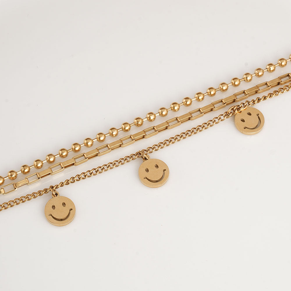 Golden Gleam Charm Bracelet
