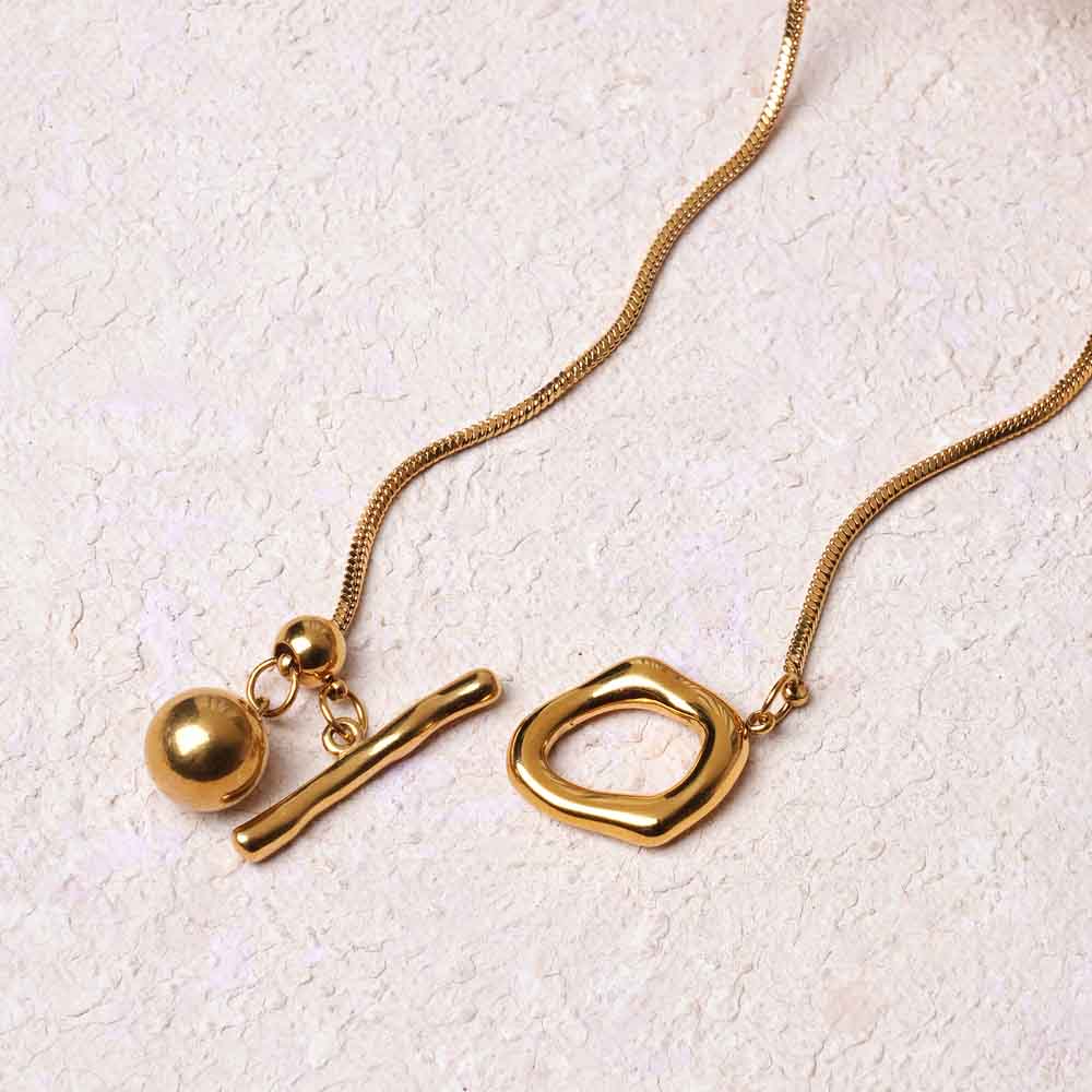 Golden Twirl Pendant Necklace