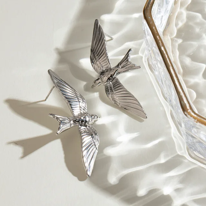 Winged Grace Silver Drop Earrings
