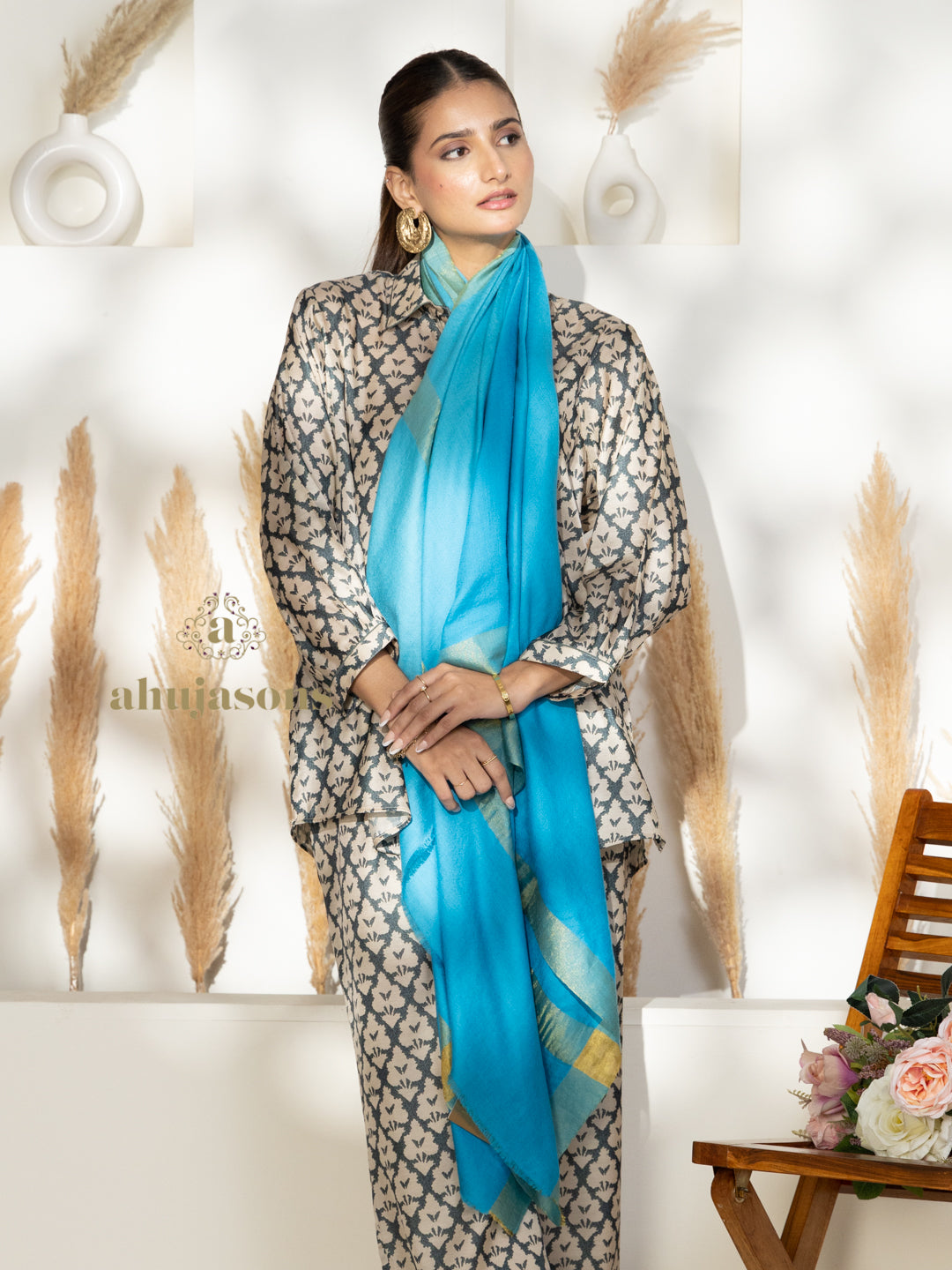 Blue Handloom Pure Pashmina Shawl accented by artisanal Contrast In Zari Border detailing