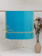 Blue Handloom Pure Pashmina Shawl accented by artisanal Contrast In Zari Border detailing
