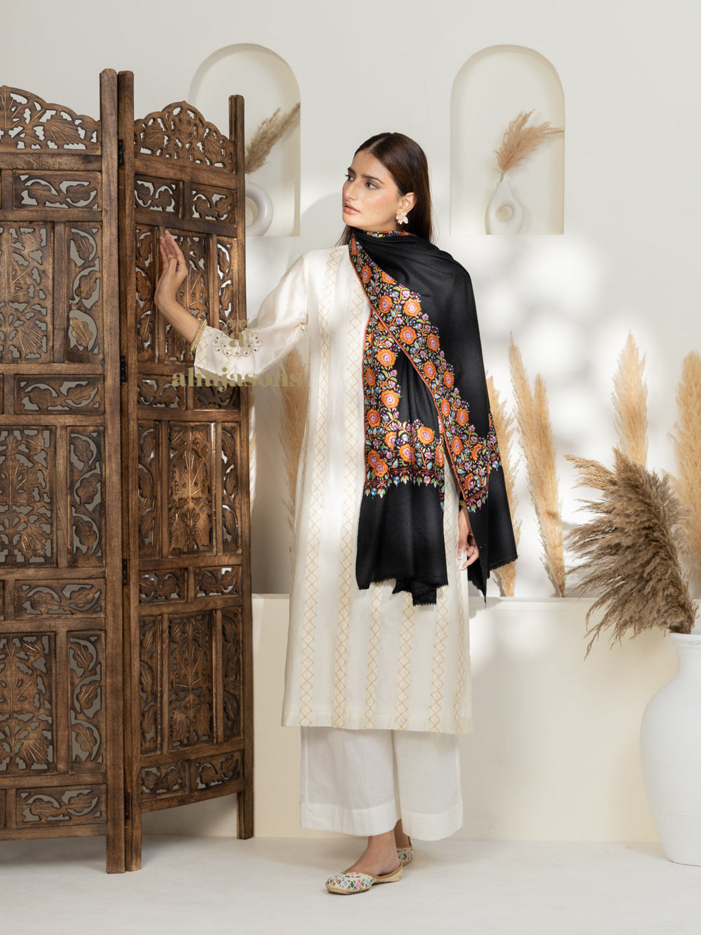 Black Handloom Pure Pashmina Shawl in a delicate Paper Mache Jaal Embroidery detailing