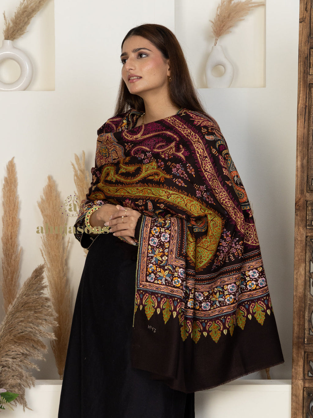Black Handloom Pure Pashmina Shawl featuring delicate Paper Mache Jaal Embroidery