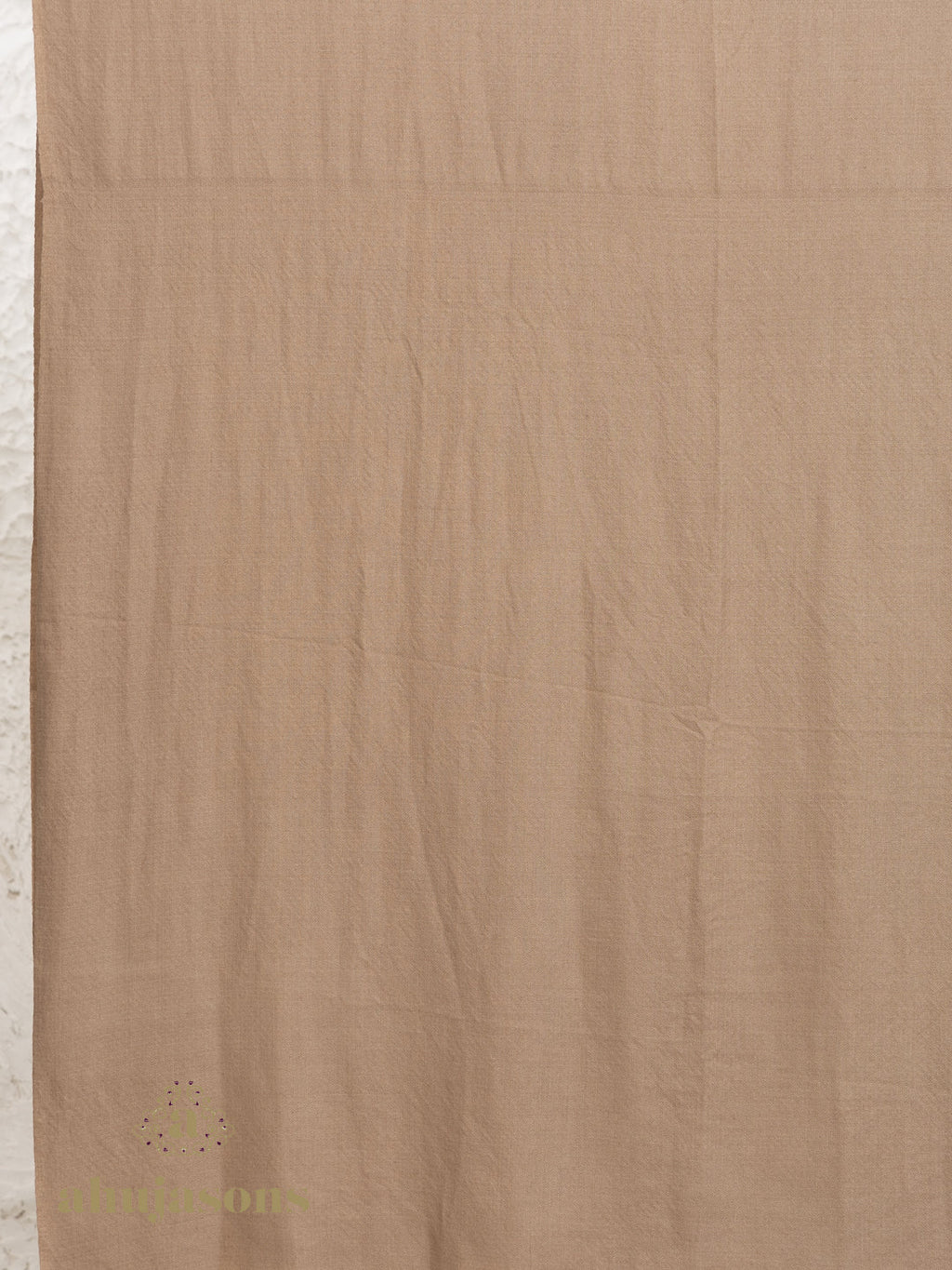 Beige Handloom Pure Pashmina Shawl adorned with sublime Solid detailing