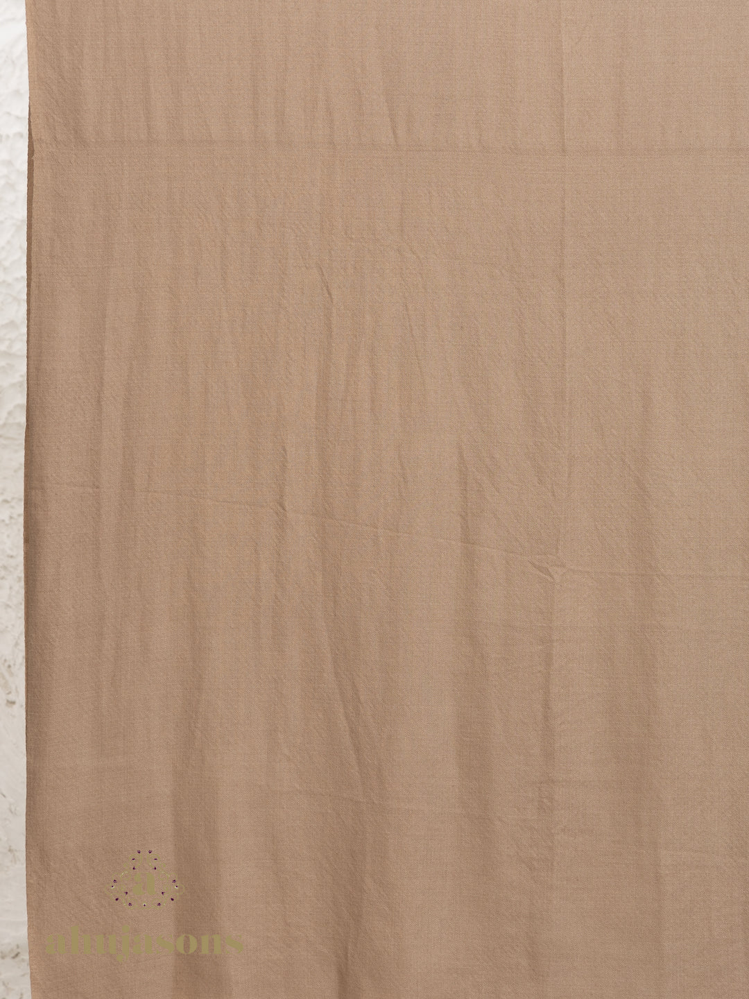 Beige Handloom Pure Pashmina Shawl adorned with sublime Solid detailing