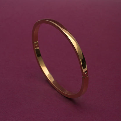Elliptical Grace Gold Bangle Bracelet