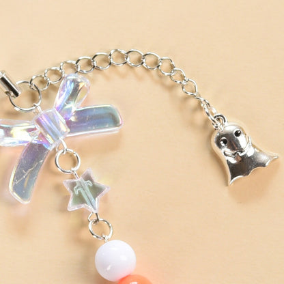 Baby Ghost On A Broom Phone Strap