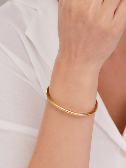 Gilded Oval Bangle Bracelet