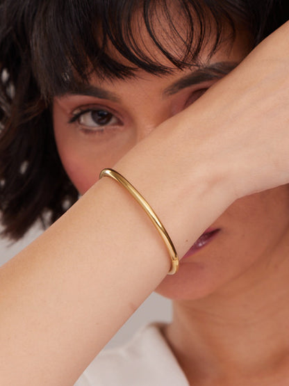 Gilded Oval Bangle Bracelet