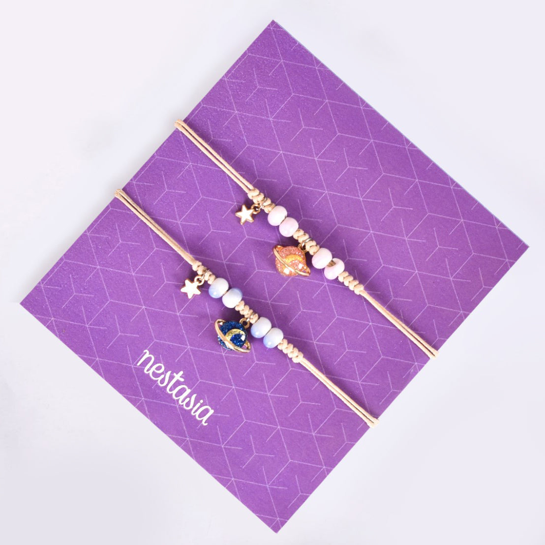 Set Of 2 Gleaming Ringed Planet Bracelets For Kids