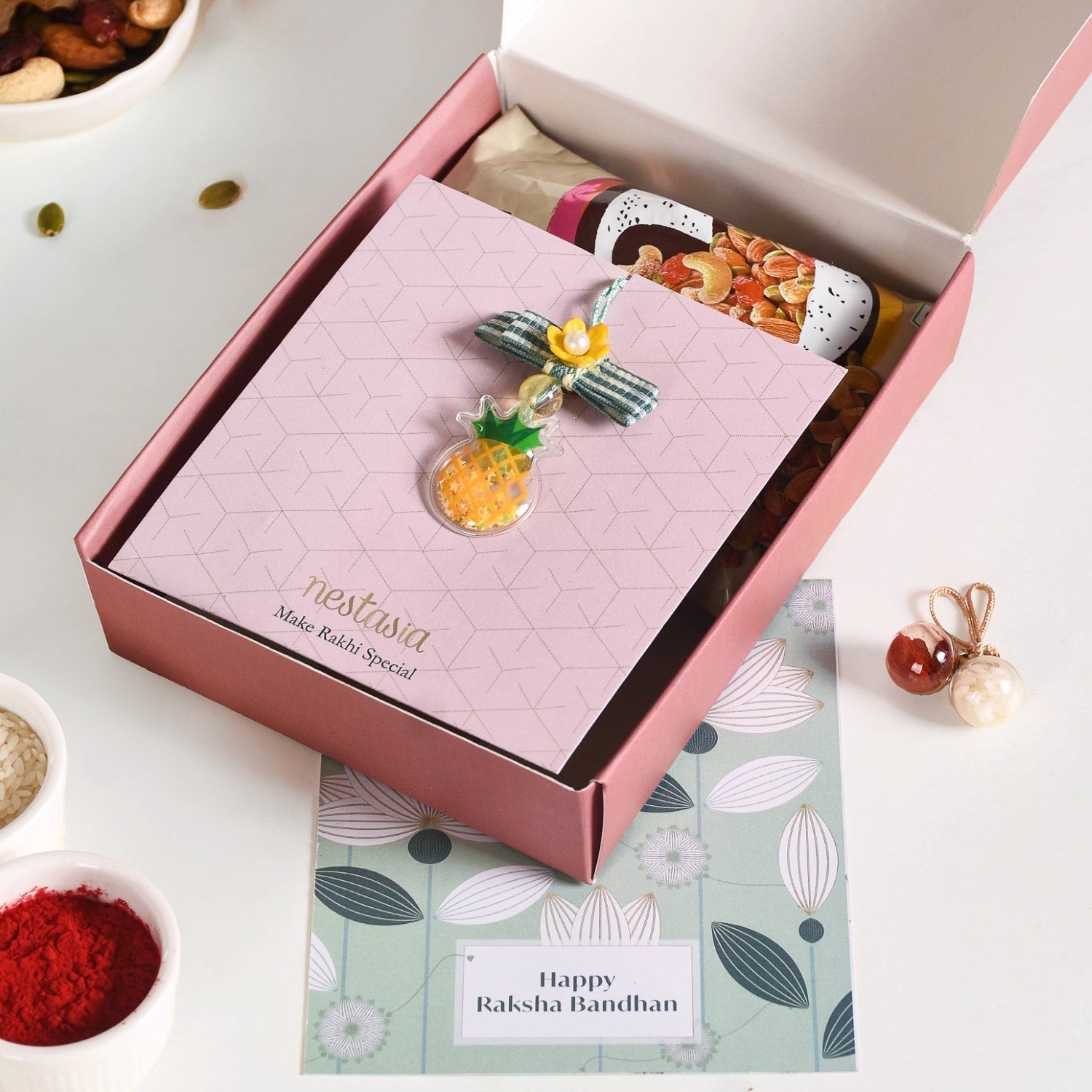 Puffy Pineapple Girl Rakhi Hamper Set Of 3 With Box And Card