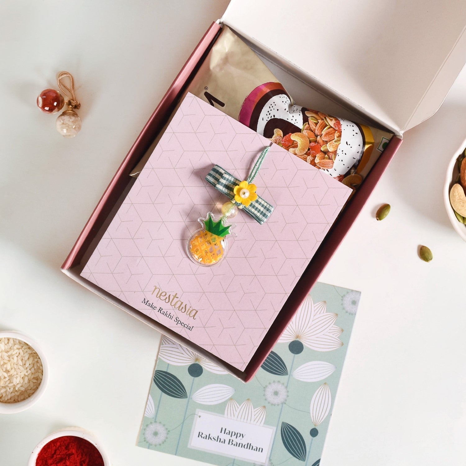 Puffy Pineapple Girl Rakhi Hamper Set Of 3 With Box And Card