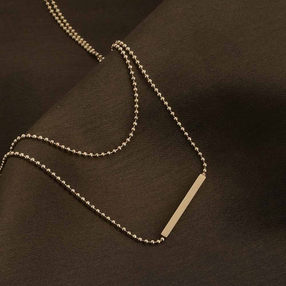 Gilded Whispers Dainty Gold Layered Necklace