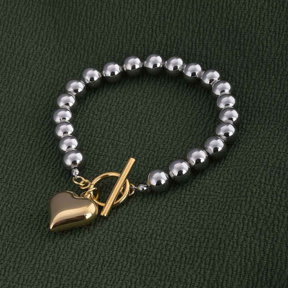 Silver Bead Bracelet with Gold Heart Charm