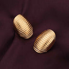 Elegant Golden Ribbed Oval Earrings