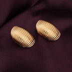 Elegant Golden Ribbed Oval Earrings