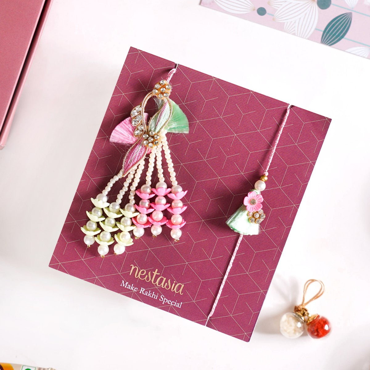 Pastel Floral Couple Rakhi Set Of 4 With Gift Box And Card