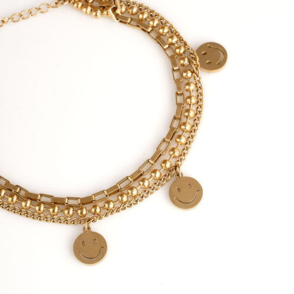 Golden Gleam Charm Bracelet