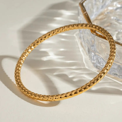 Gold Plated Circle Hammered Buddhist Bracelet