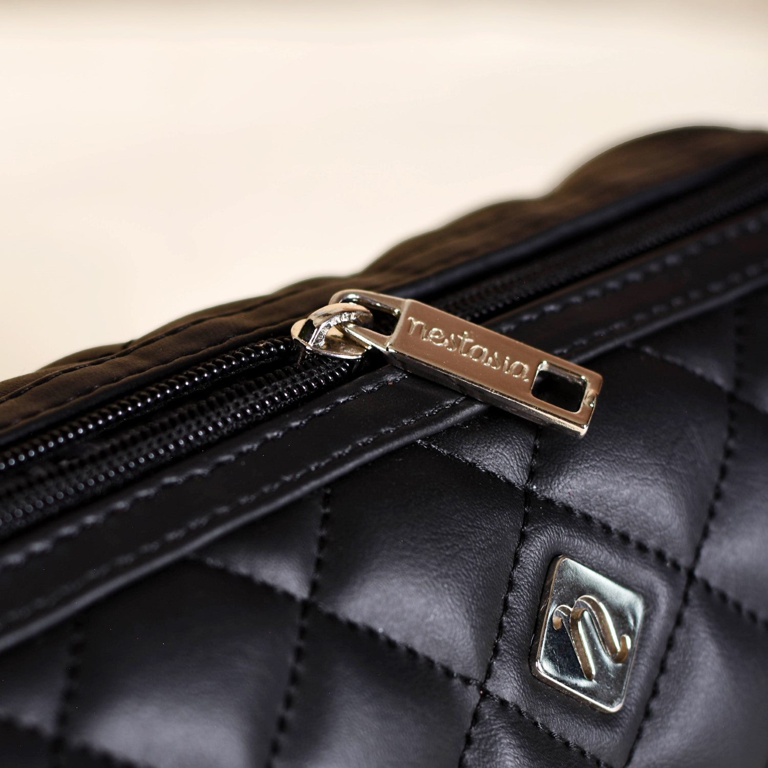 Black Quilted Mini Barrel Bag