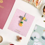 Puffy Pineapple Girl Rakhi Hamper Set Of 3 With Box And Card