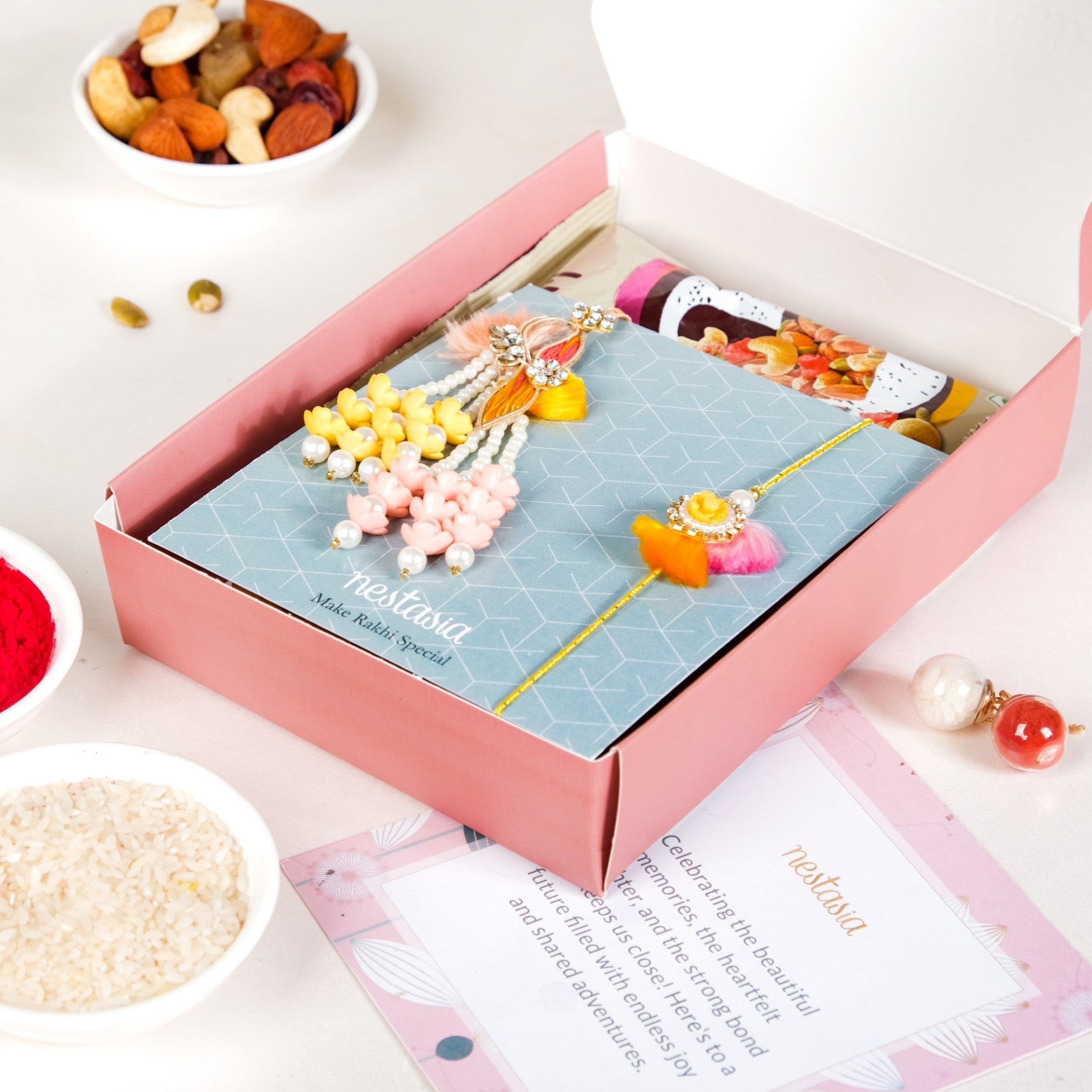 Pastel Elegance Rakhi Gift Hamper For Couple